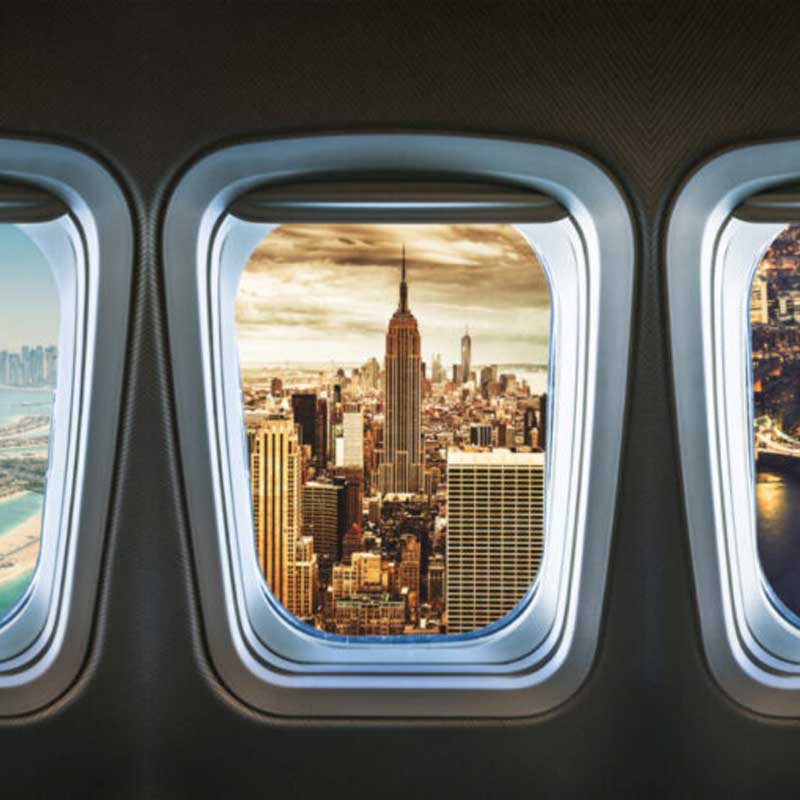 Plane windows showing multiple countries